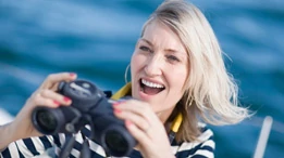 woman using binoculars
