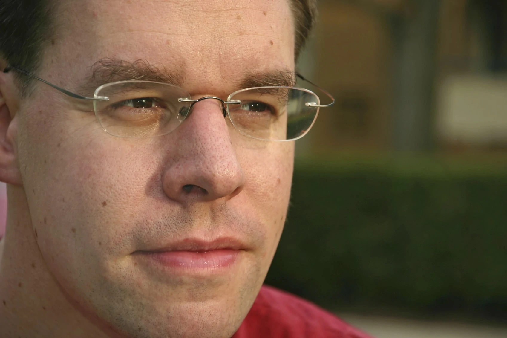 Man looking considering if he should get LASIK